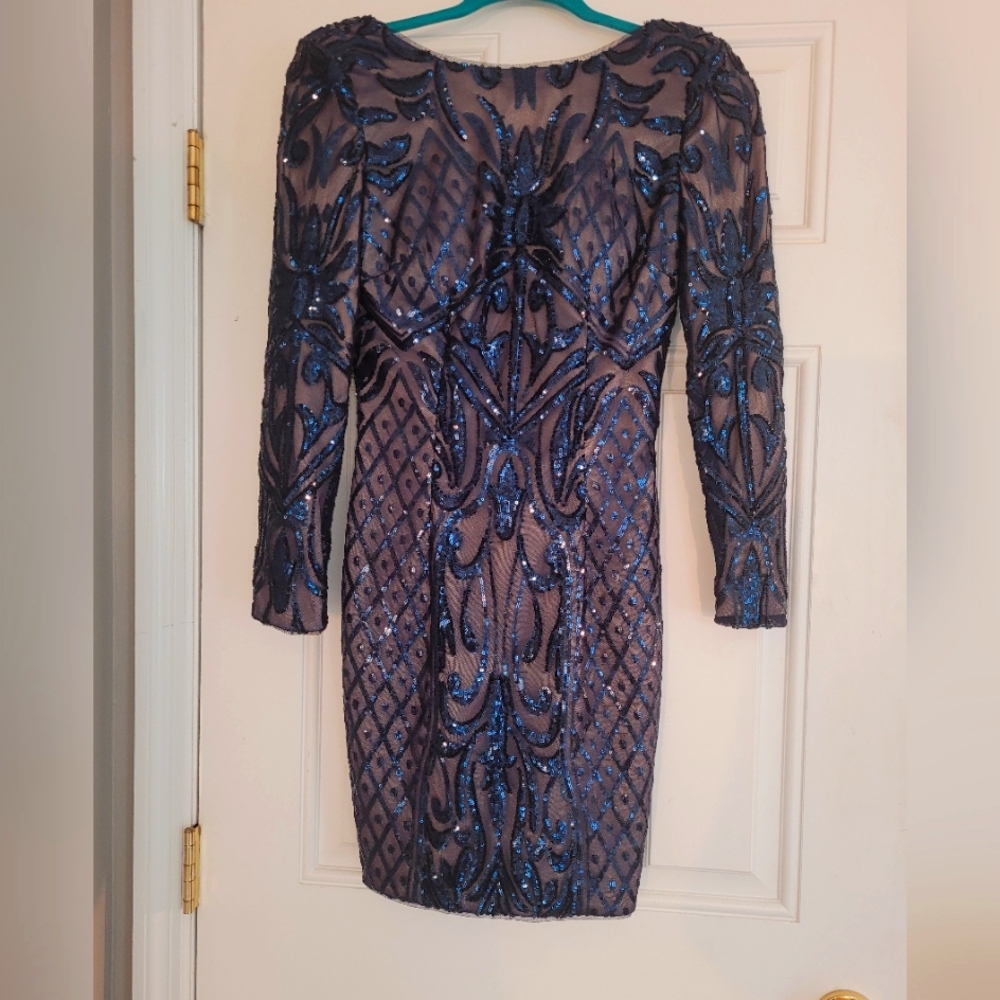 Beautiful NWT Bariano navy blue sequin dress. Size 4. Long sleeve.